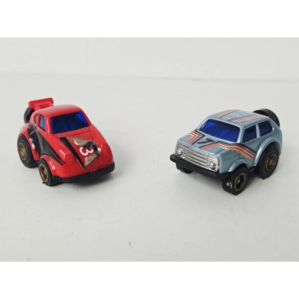 Vintage MC Toy pull back race car pair